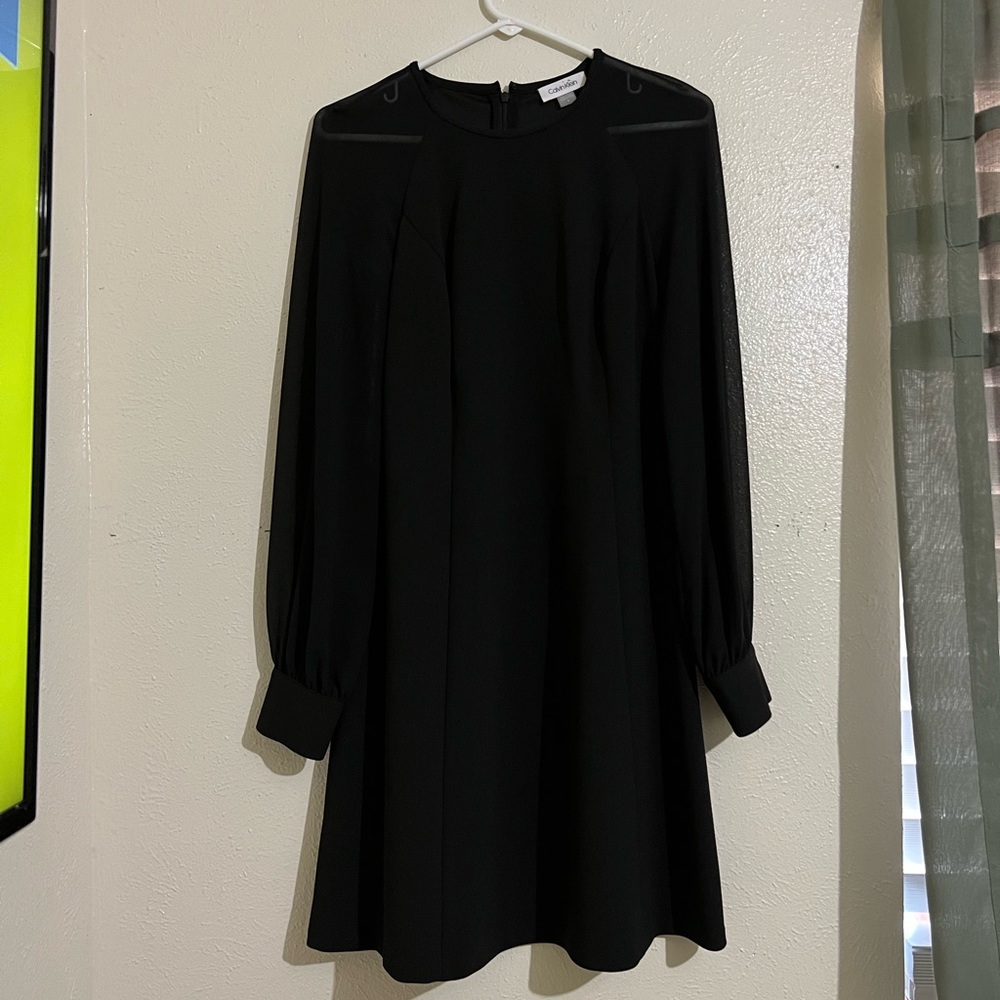 Black formal dress. Mesh long sleeve.